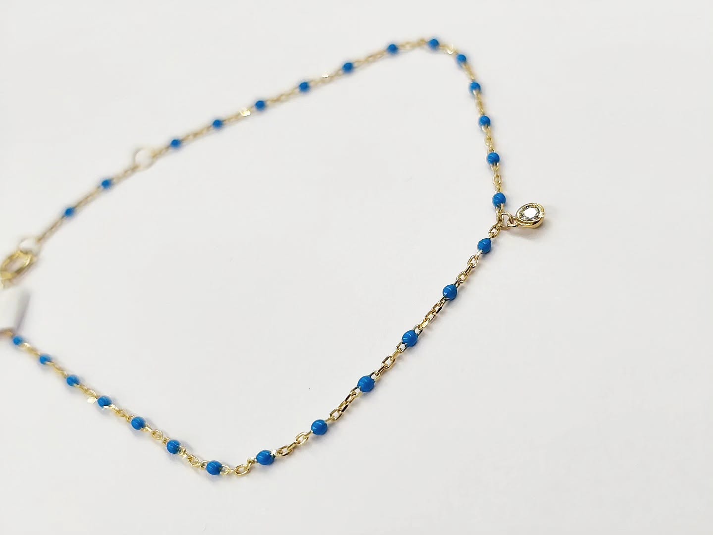 chryso-vrachioli-9k-me-mple-smalto-kai-kremasto-leyko-zirgon-chain-bracelet