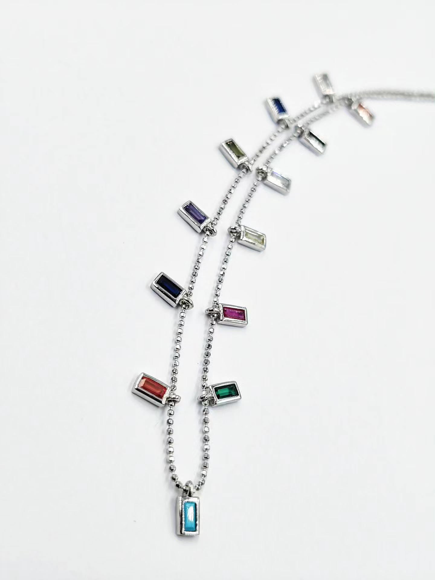 gynaikeio-asimenio-kolie-925-pallete-zircon-chain-me-polychroma-zirgon-mpagketa